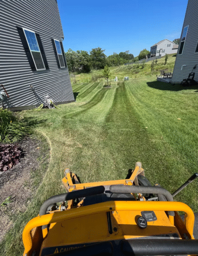 Lawn mowing in progress by Weadickbros Lawn & Landscape